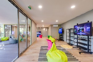 Multimedia game lounge