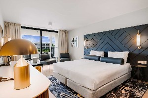 1 King Bed Deluxe Partial Oceanview