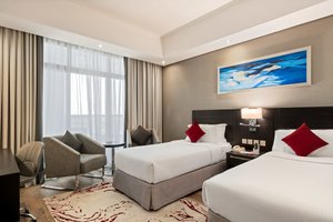 Spacious room with racecourse views.