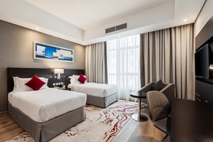 Contemporary room with king or twin beds.