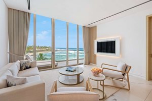 Beachfront suite with lounge, kitchenette & butler