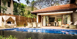 Spacious rooms, private pool, serene garden views.
